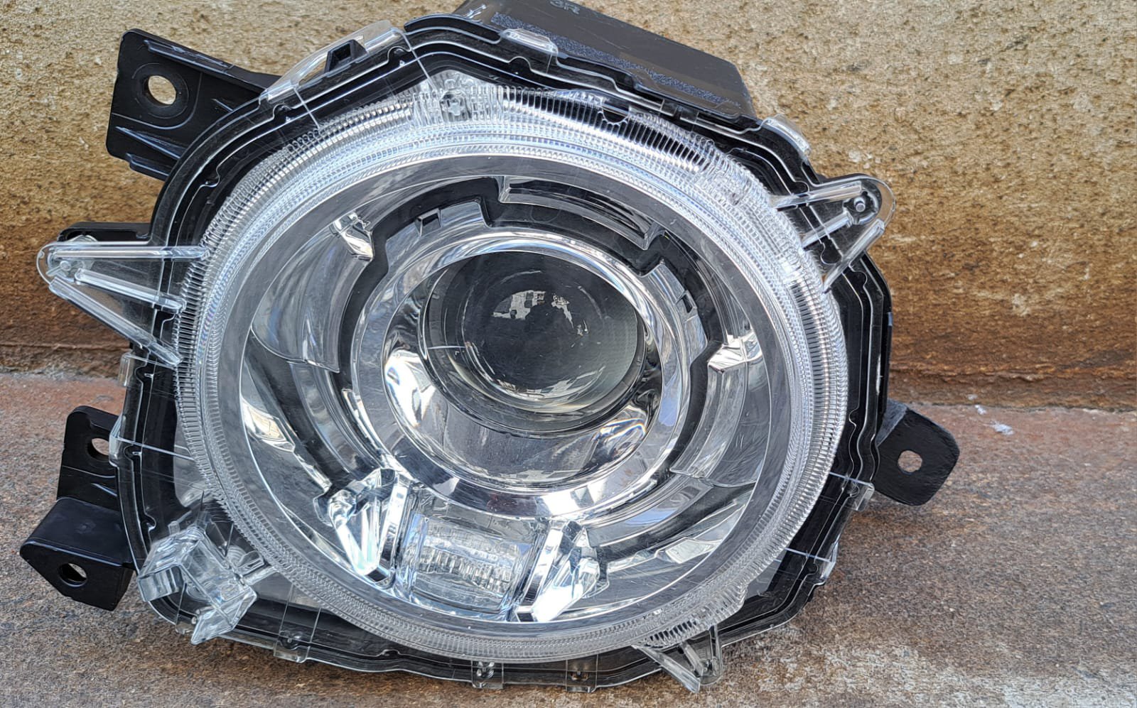 Suzuki Jimny left headlight